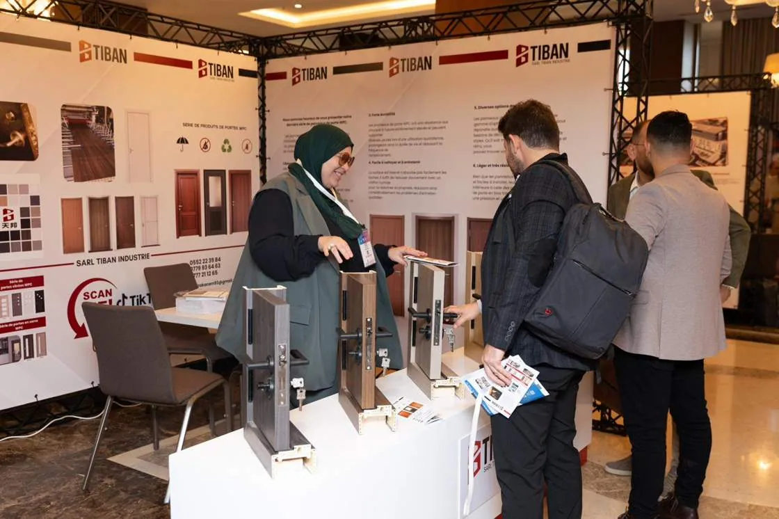 Visitors at the TIBAN Industrie stand, the WPC door range on display